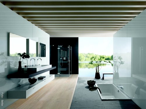 Schlichte Schönheit verströmt dieses Bad. Rund um das Aufsatzwaschbecken bleibt viel Ablage- und Staufläche. Die transparente Glasdusche und die in den Boden eingelassene Badewanne lassen das Luxusbad noch großzügiger wirken.<br /> Schlichte Schönheit verströmt dieses Bad. Rund um das Aufsatzwaschbecken bleibt viel Ablage- und Staufläche. Die transparente Glasdusche und die in den Boden eingelassene Badewanne lassen das Luxusbad noch großzügiger wirken.<br />